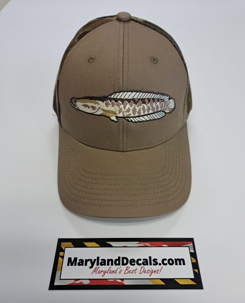 A Khaki Color Hat With a Fish Embroidery One